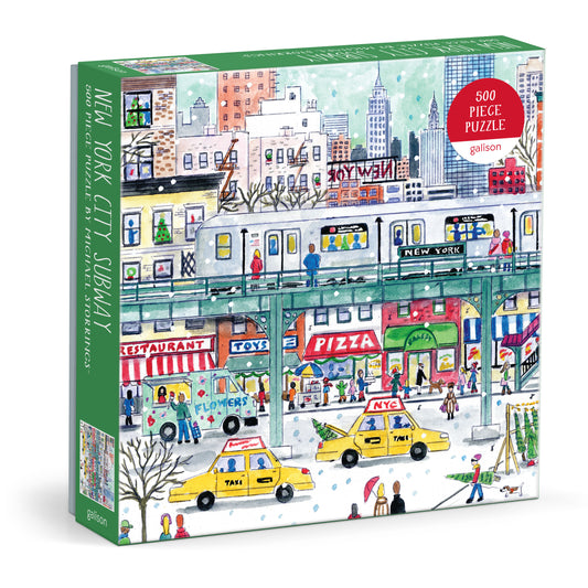 Jigsaw puzzle box with a colorful illustration of a New York City street scene, featuring a subway train and various shops.