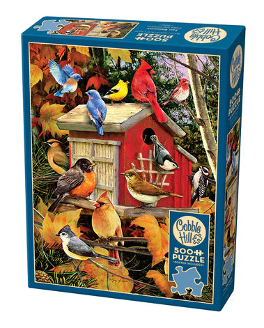 Cobble Hill Fall Birdhouse 1000-piece jigsaw puzzle featuring colorful birds visiting charming birdhouses surrounded by vibrant autumn foliage.