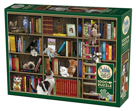 Cobble Hill Kitty Librarians 1000-piece jigsaw puzzle featuring adorable cats in a cozy library surrounded by bookshelves, books, and charming literary details.