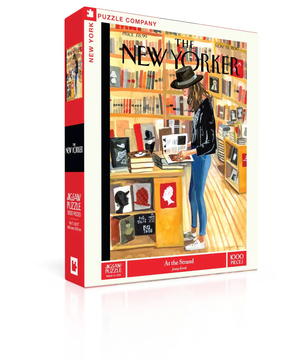 New York Puzzle Company At the Strand 1000-piece jigsaw puzzle featuring the famous Strand Bookstore with endless bookshelves, book lovers, and iconic New York literary charm.