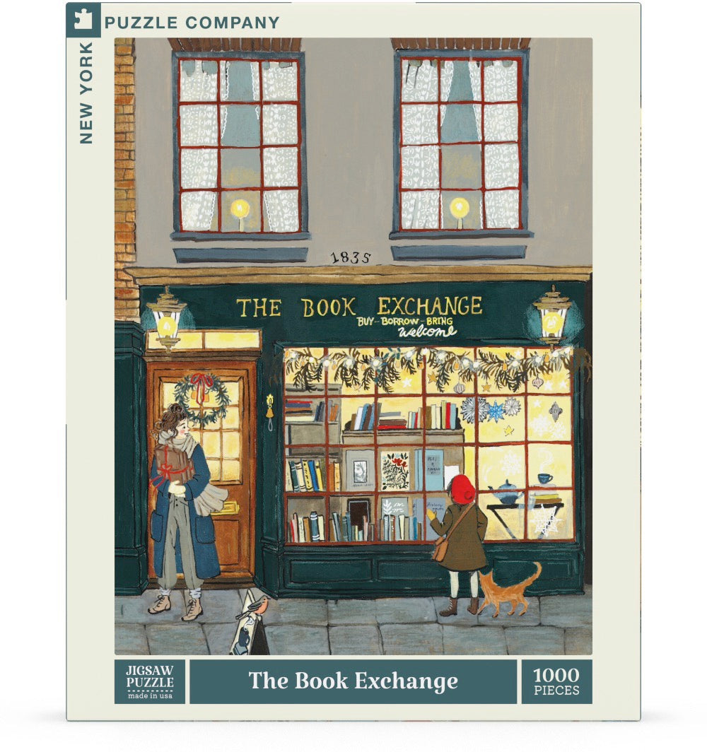 New York Puzzle Company The Book Exchange 1000-piece jigsaw puzzle featuring a welcoming neighborhood bookshop filled with books, readers, and a cozy literary atmosphere.