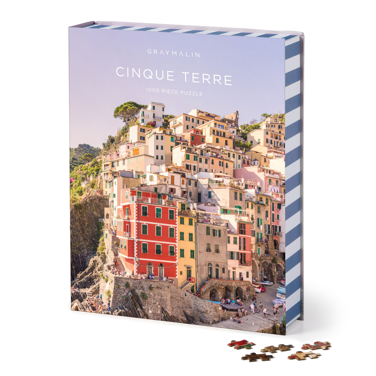 Galison Gray Malin Cinque Terre 1000-piece book jigsaw puzzle featuring the colorful cliffside villages of Cinque Terre along the Italian Riviera.