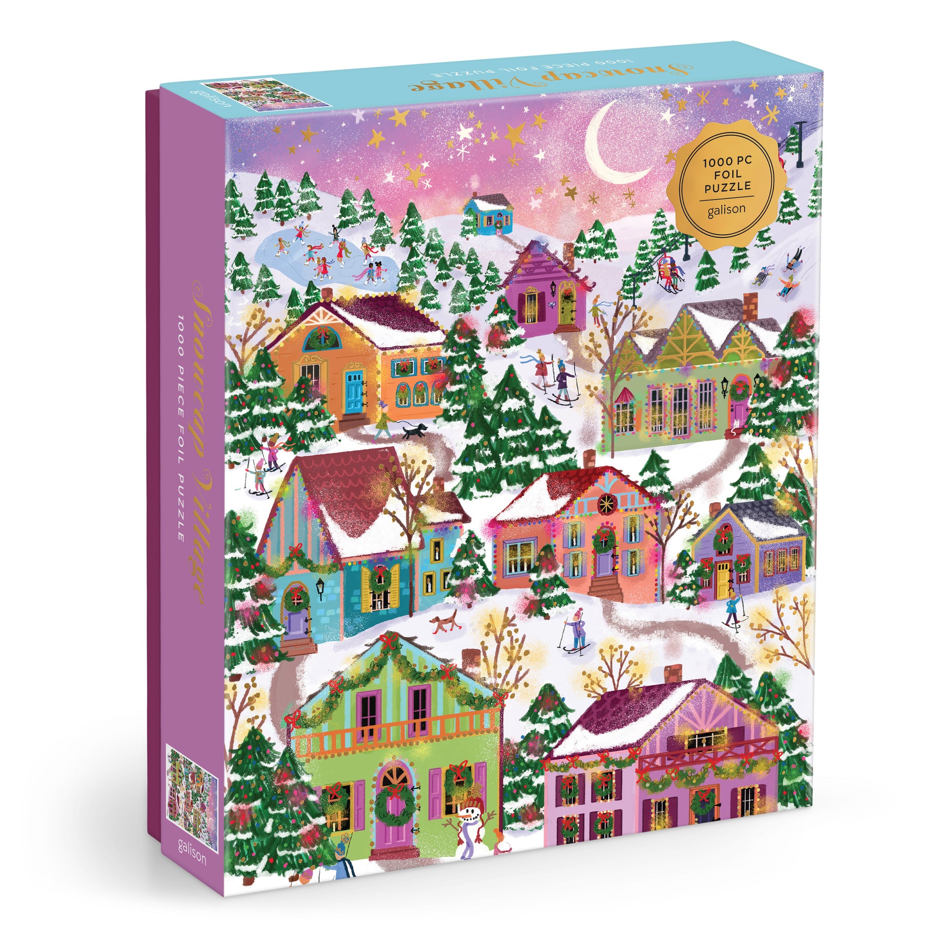 Galison Joy Laforme Snowcap Village 1000-piece foil jigsaw puzzle featuring a magical snow-covered village with sparkling foil accents, cozy homes, and festive winter scenery.