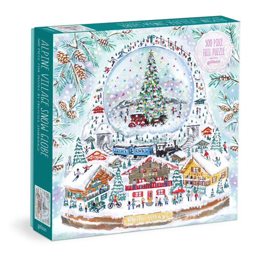 Galison Michael Storrings Alpine Village Snowglobe 500-piece foil jigsaw puzzle featuring a charming alpine village inside a festive snow globe with shimmering foil details.