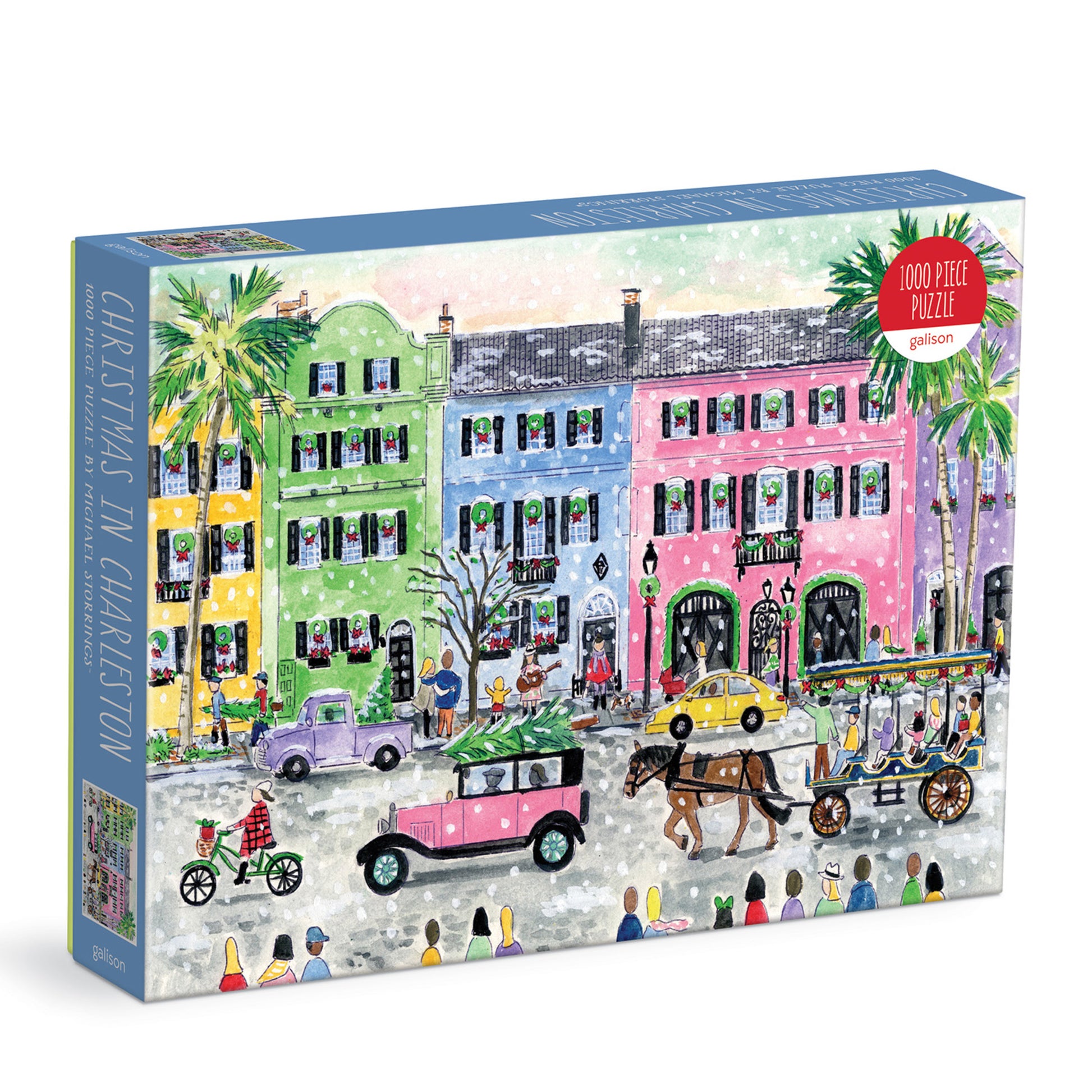 Galison Michael Storrings Christmas in Charleston 1000-piece jigsaw puzzle featuring historic Charleston decorated for Christmas with festive lights, wreaths, elegant homes, and holiday charm.