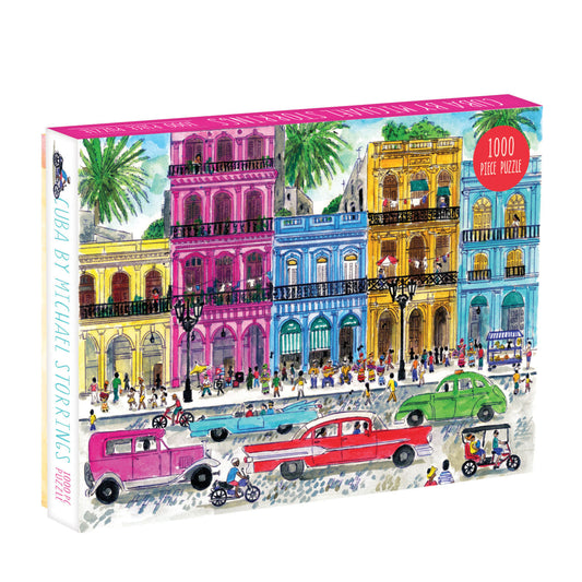 Galison Michael Storrings Cuba 1000-piece jigsaw puzzle featuring colorful streets of Cuba with classic vintage cars, colonial architecture, tropical scenery, and vibrant island culture.