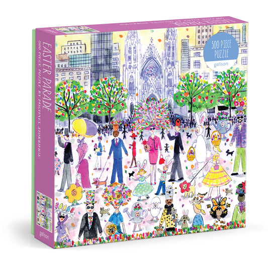 Galison Michael Storrings Easter Parade 500-piece jigsaw puzzle featuring a joyful Easter parade with festive costumes, spring flowers, colorful eggs, and cheerful city streets.