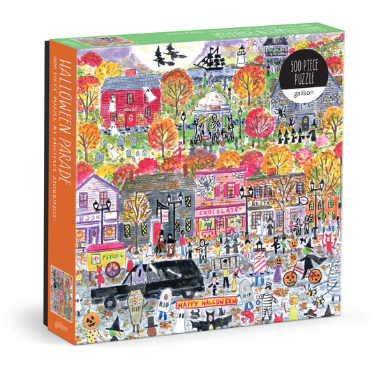 Galison Michael Storrings Halloween Parade 500-piece jigsaw puzzle featuring a festive Halloween parade with costumes, pumpkins, and colorful autumn decorations.