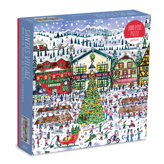 Galison Michael Storrings Santa's Village 1000-piece jigsaw puzzle featuring Santa's festive village with decorated cottages, cheerful elves, snowy landscapes, and magical Christmas spirit.